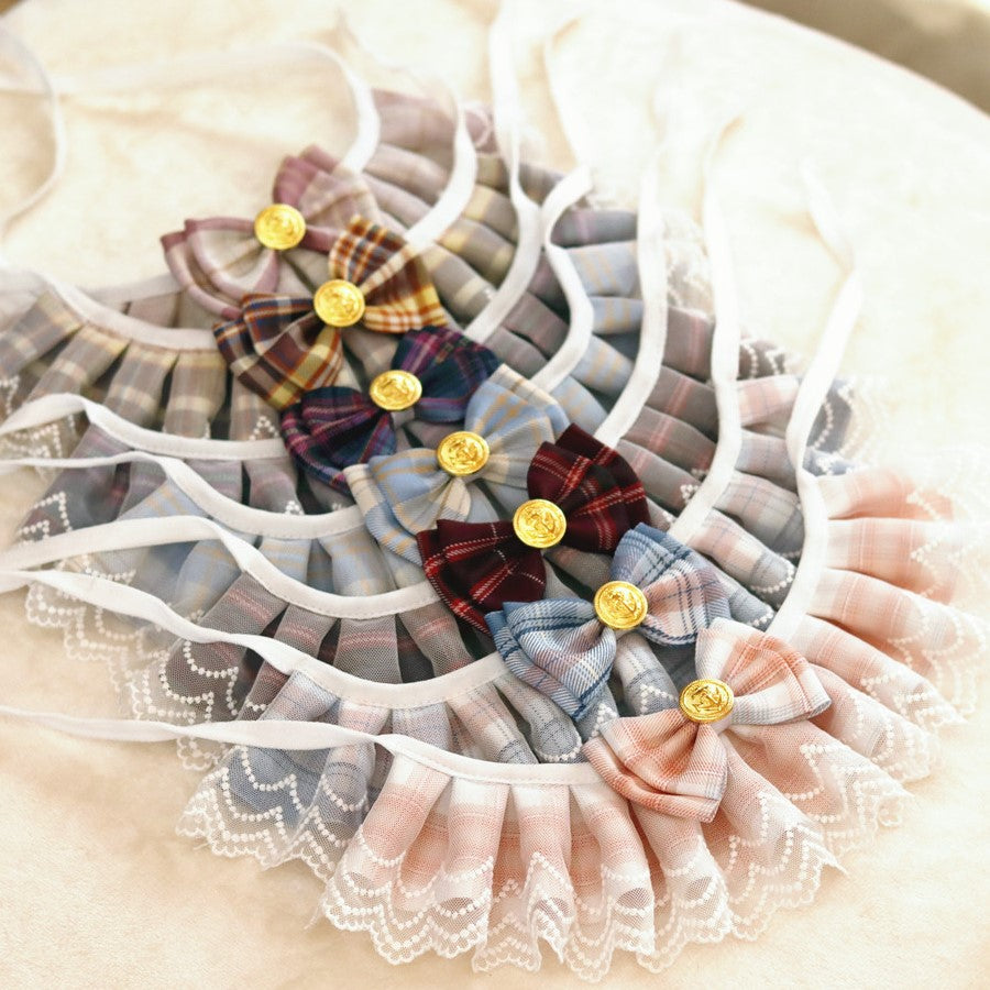 A pile of pet bib made of lace