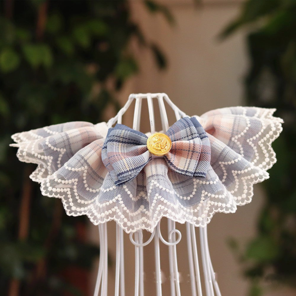 A blue pet bib made of lace
