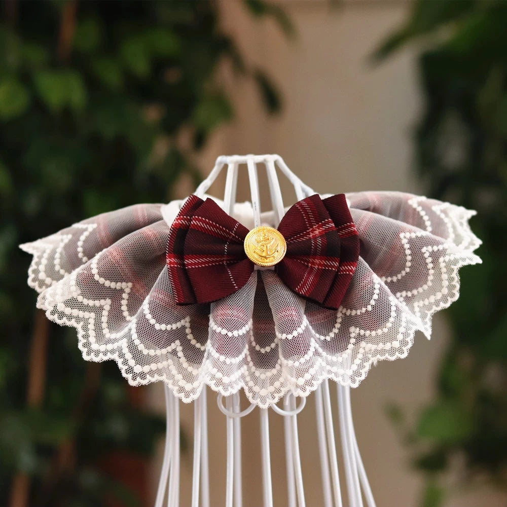 A wine red pet bib made of lace